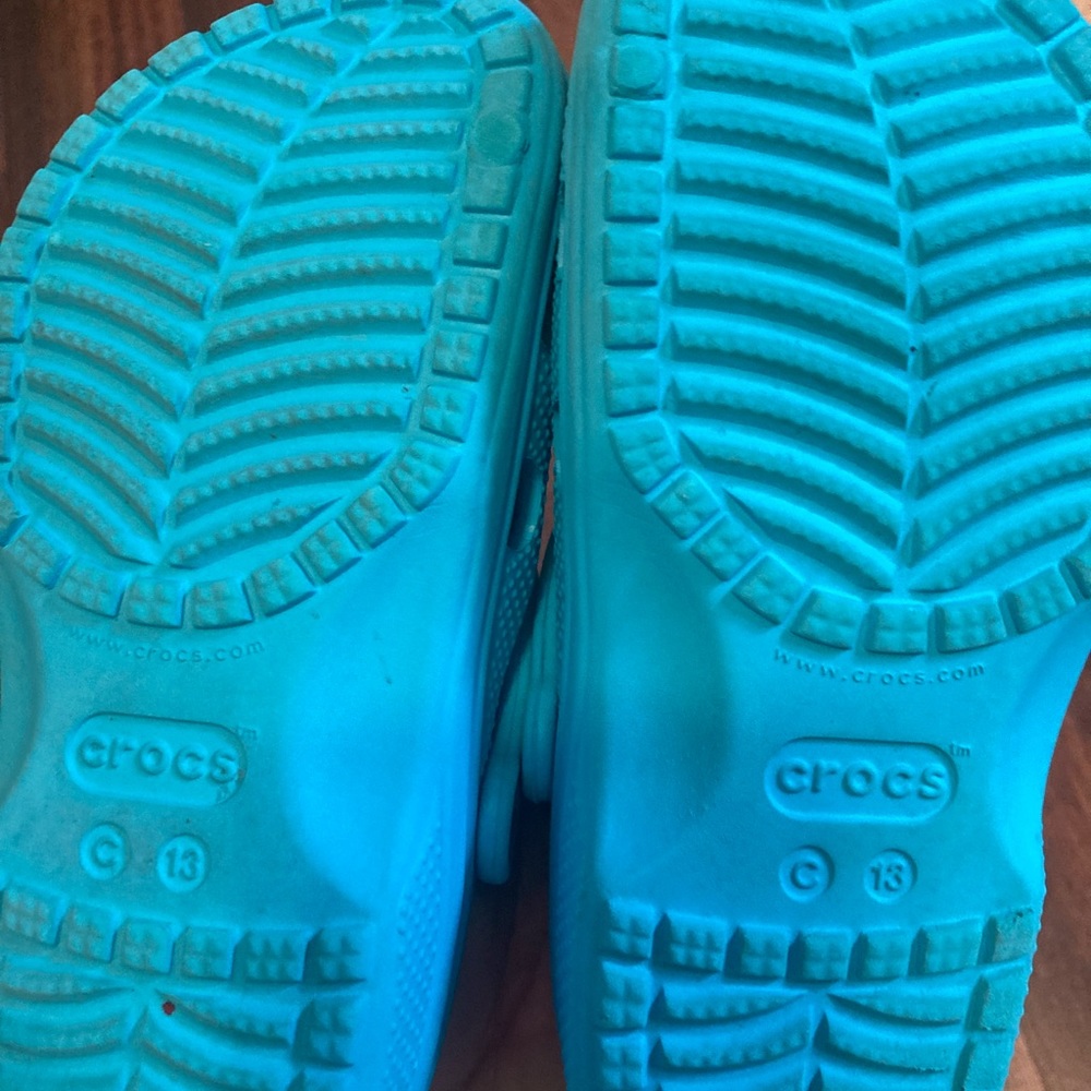 Crocs.  Youth size 13